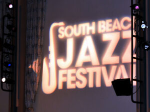 South Beach Jazz Festival logo projected on a screen