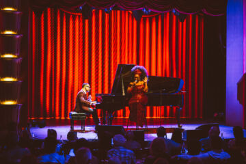 Aymée Nuviola sings while Gonzalo Rubalcaba plays the piano at the Faena Theater