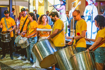 MiamiBloco joins Munir Hossn & Elas on stage during their performance at the South Beach Jazz Festival
